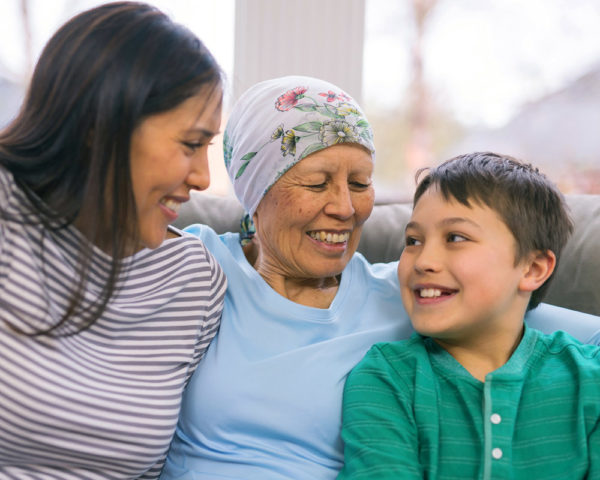 Elderly patient with daughter and grandson